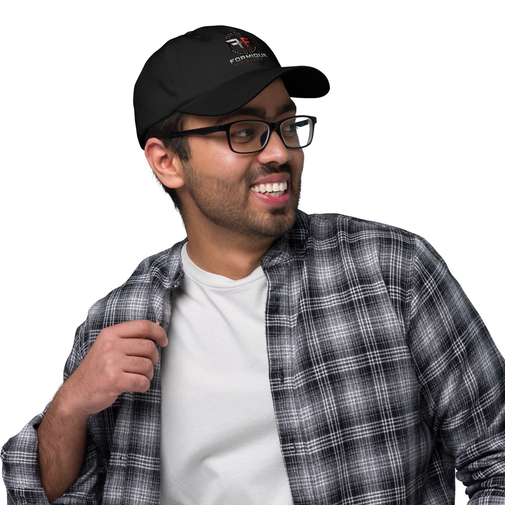 Man wearing black Formique Fitness dad hat with embroidered logo, low profile, curved visor, and adjustable strap